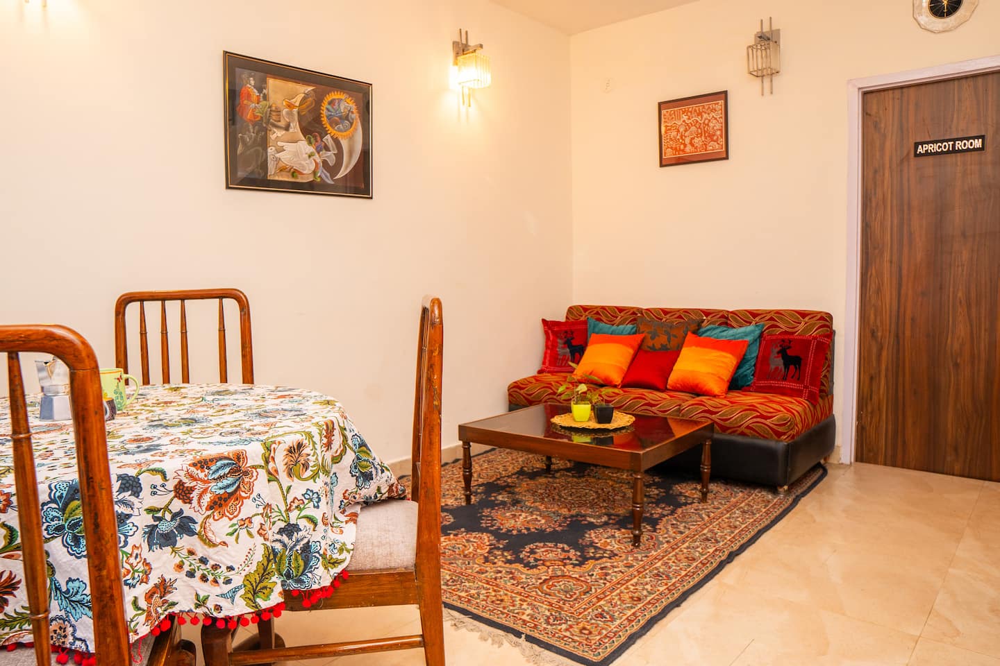 Drawing room with sofa, rug and a low wooden table